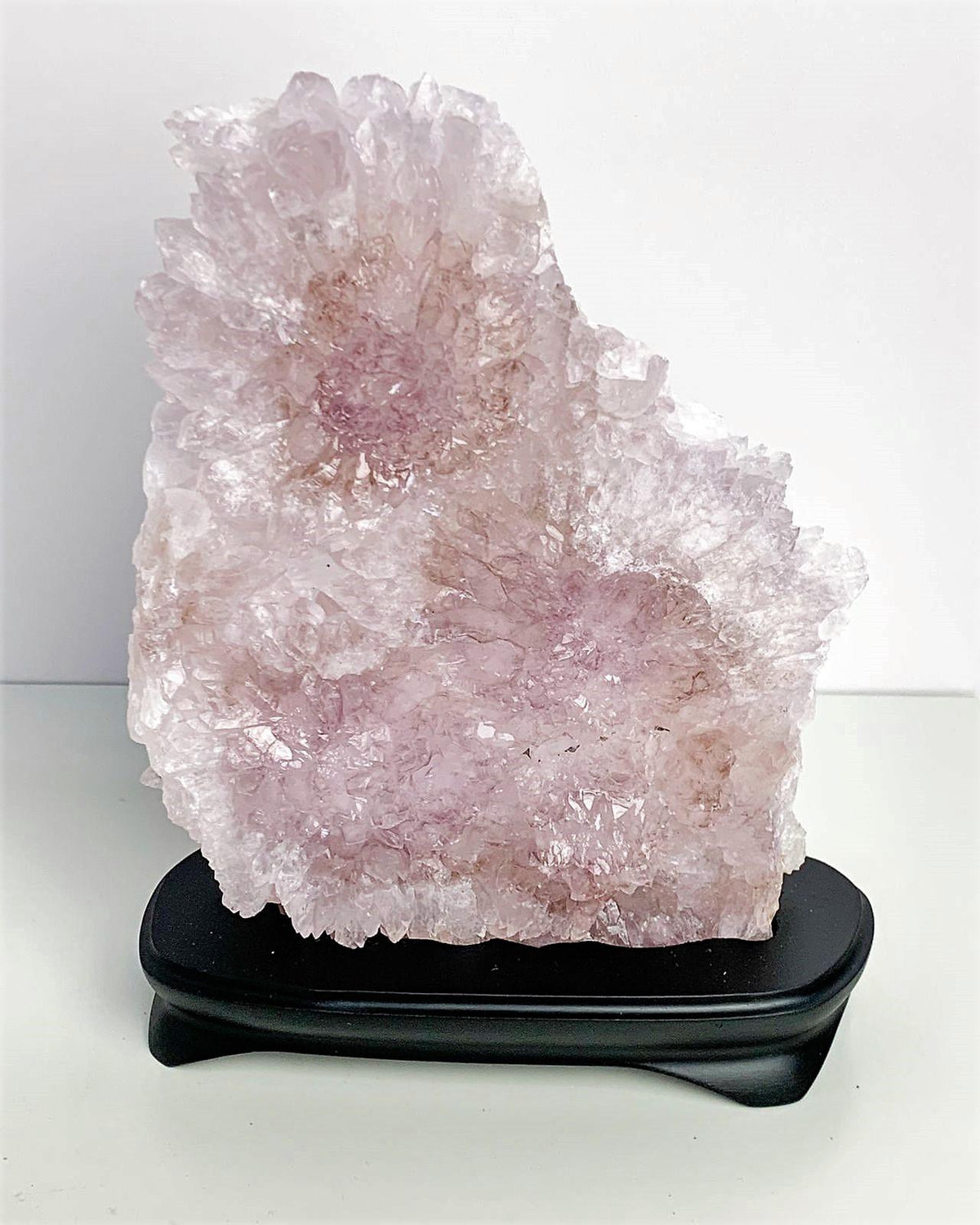 Pedra Flor de Ametista com base madeira 2,110 Kg