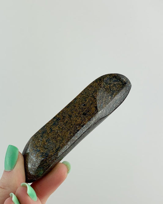 Bastão Massageador Bronzita entre 105 a 129 gramas