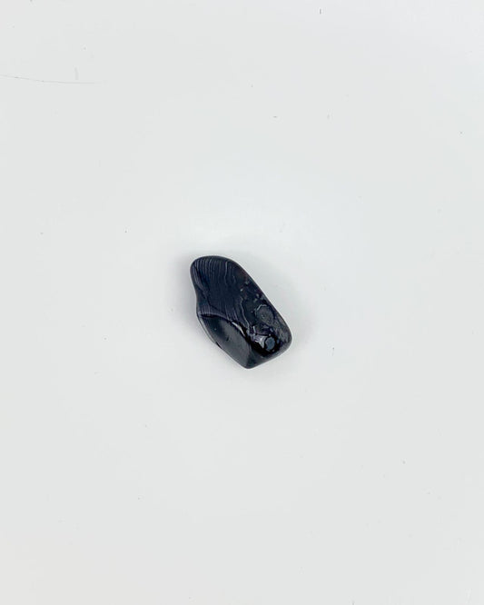 Pedra Merlinita(Psilomelana) rolada 2 a 5 gramas