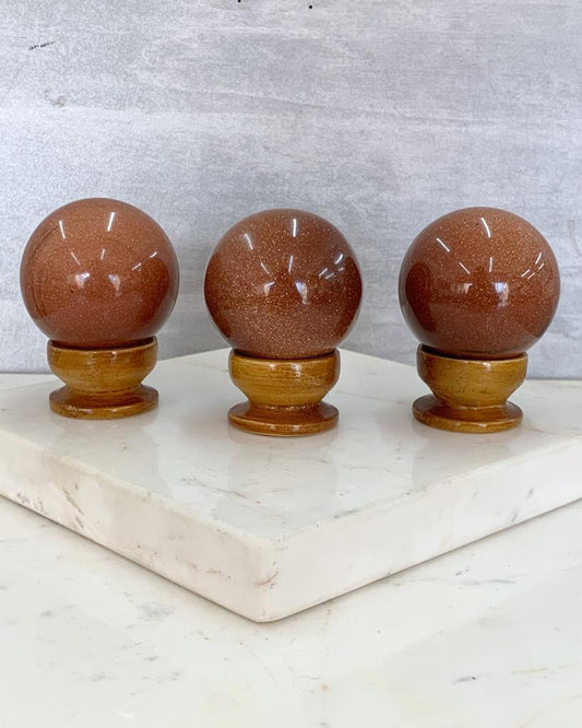 Bola Goldstone marrom 4,6 cm aprox.