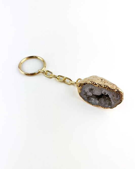 Chaveiro eletroplate Geodo Ágata natural dourado