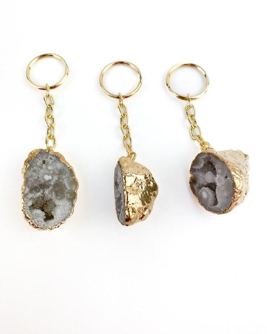 Chaveiro eletroplate Geodo Ágata natural dourado