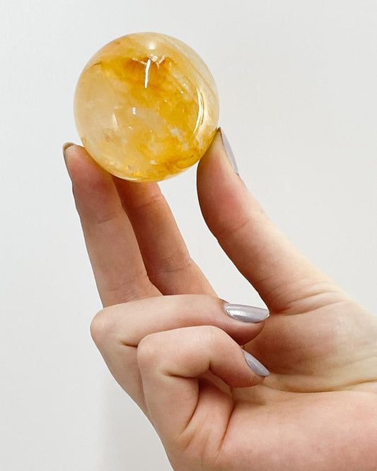 Bola Quartzo Agente Cura Ouro 4,6 cm aprox.