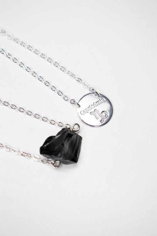 Escapulário Signo Capricórnio - Obsidiana Preta Bruta banhado Prata
